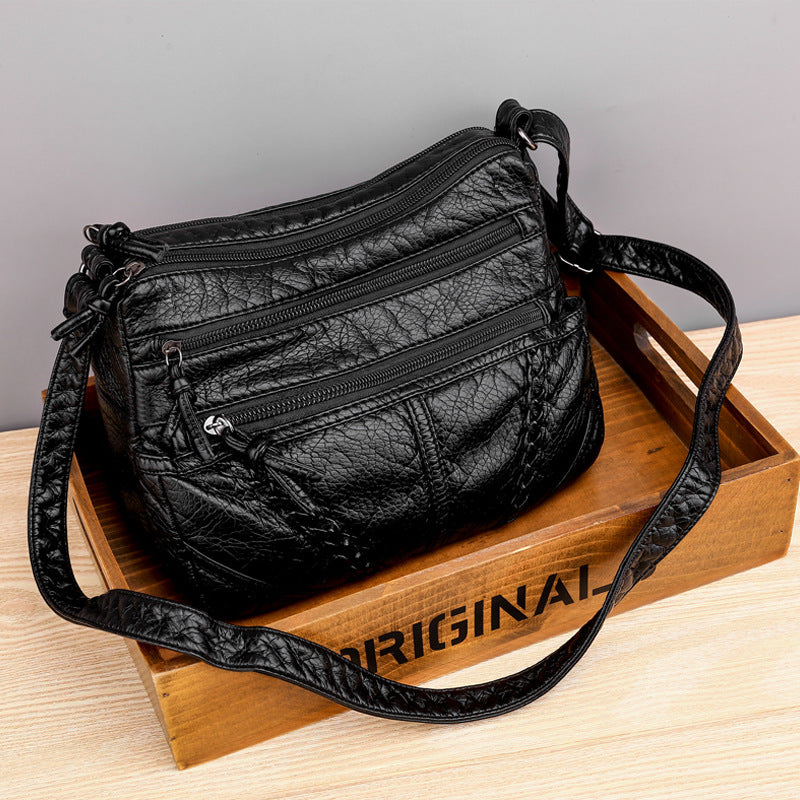 Amy™ - Pequeño Bolso de Mano de Cuero