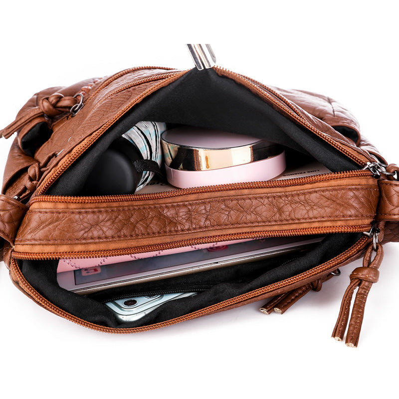 Amy™ - Pequeño Bolso de Mano de Cuero