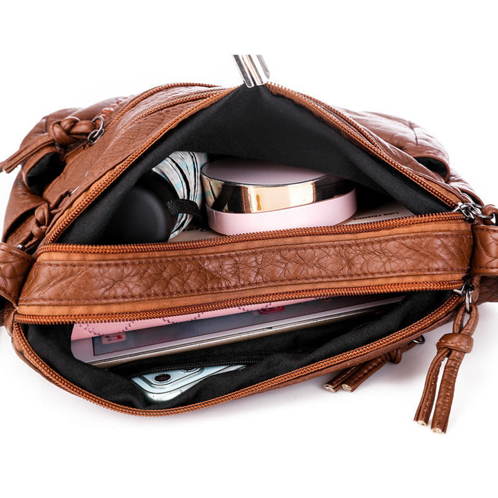 Amy™ - Pequeño Bolso de Mano de Cuero
