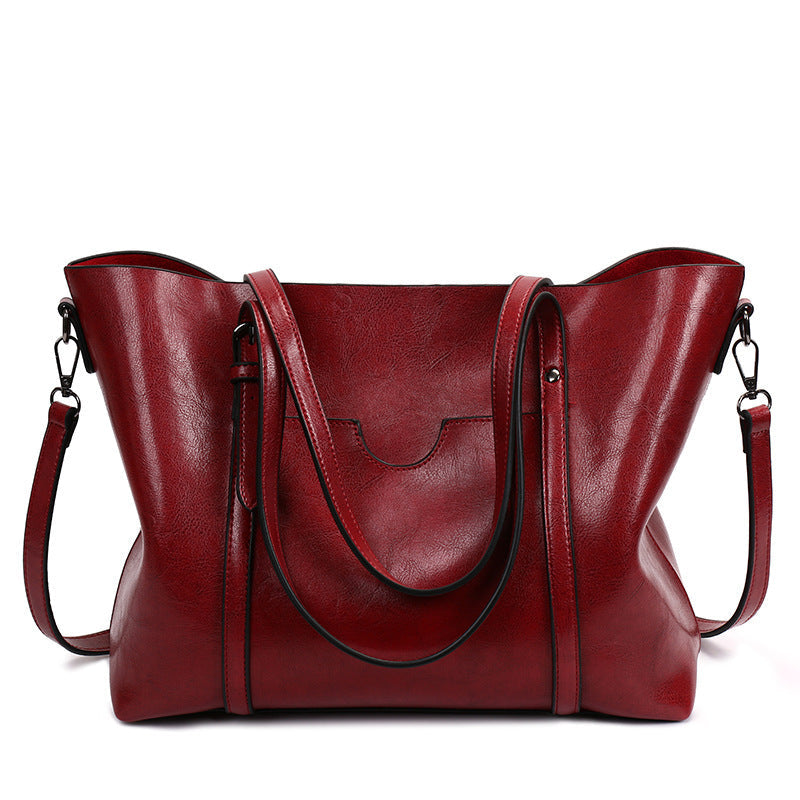 Lucie™ - Bolsa Práctica Elegante